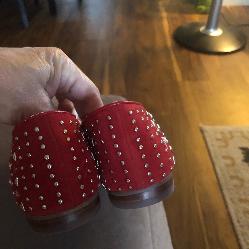 Red BCBG embellished flats.